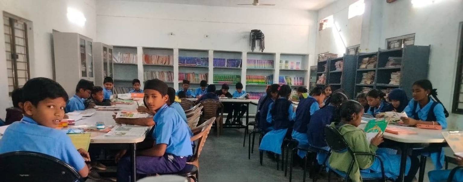Students reading in the school library
